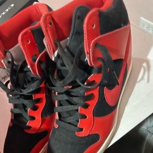 Red and black wedge Nikes